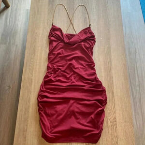 Beautiful ruched bodycon. Backless with gold chain straps.